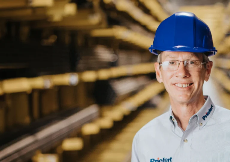 A man with a blue helmet on his head.